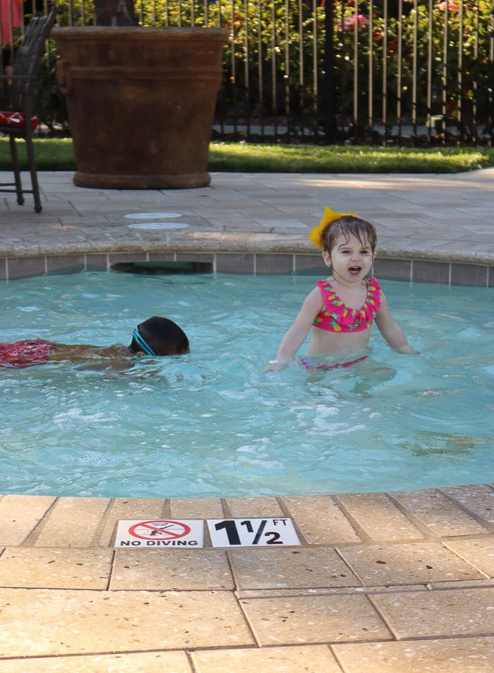 Had to include one of these...this little boy kept coming up to her...her face cracks me up...right after, she climbed out...ha...too close too close!