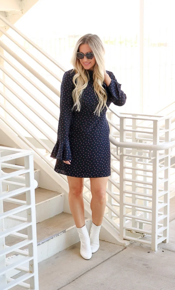 White Boot Trend With A Flattering Navy Mini