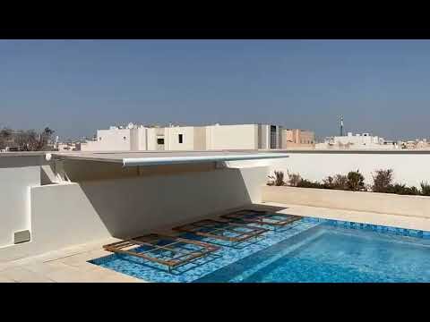 Awning for pool deck , Jabriya Kuwait. Gulfshading Smart Shading by Aquasan