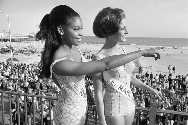 Miss Iowa, Cheryl Adrienne Brown, the first African American to reach the finals in the Miss America Pageant, on the boardwalk in Atlantic City, NJ, in 1970 with Miss Maryland, Sharon Ann Cannon