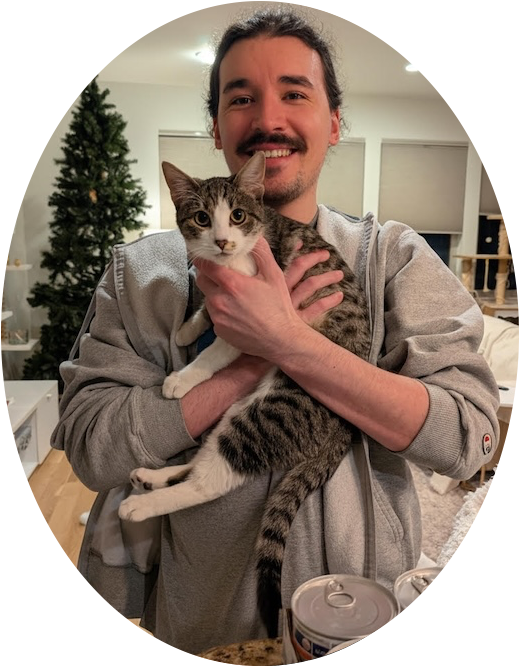 Denver Pro Pet Sitter Sean M. holding and caring for cat