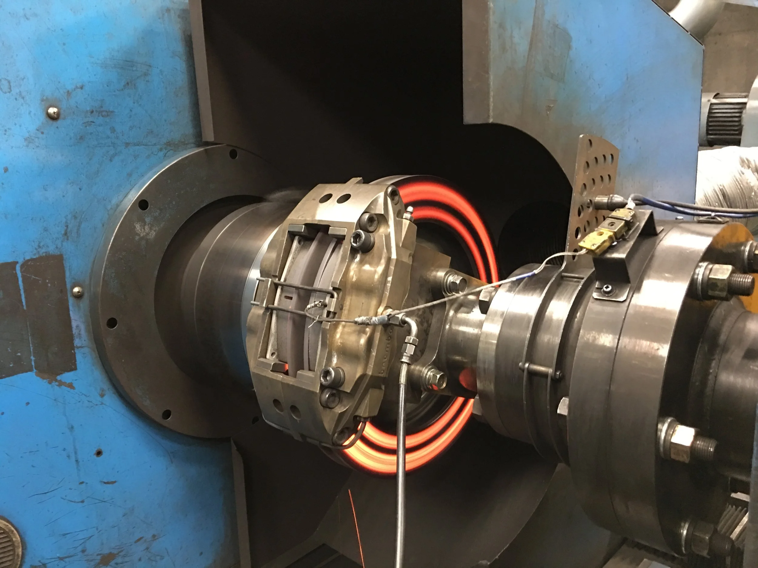 BRAKE COMPONENTS BEING RUN ON A BRAKE DYNAMOMETER. PHOTO CREDIT: GANESH KRISHNAN
