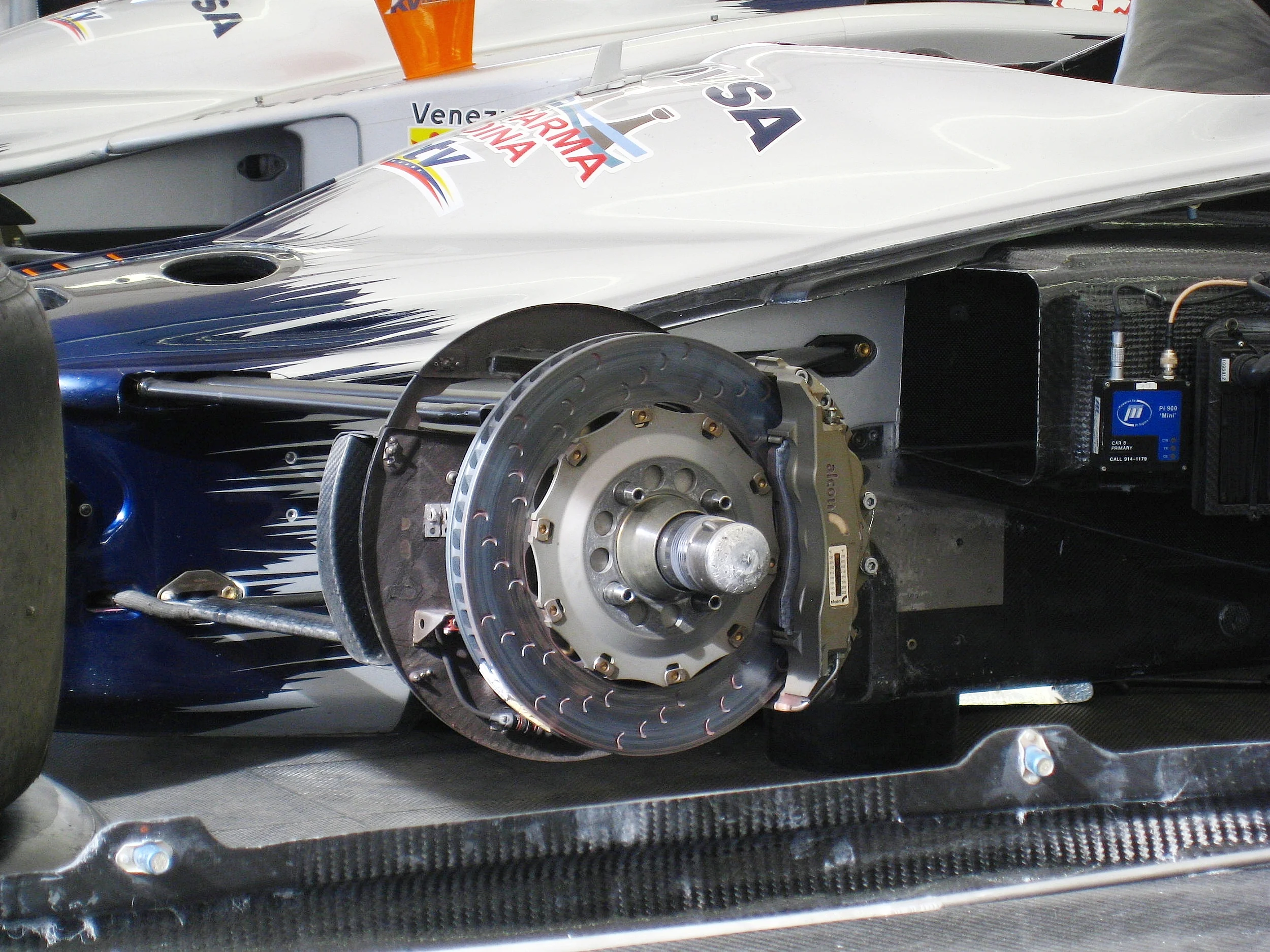 Alcon Indycar iron brake package with caliper temperature indicator stickers. Photo Courtesy: Ganesh Krishnan