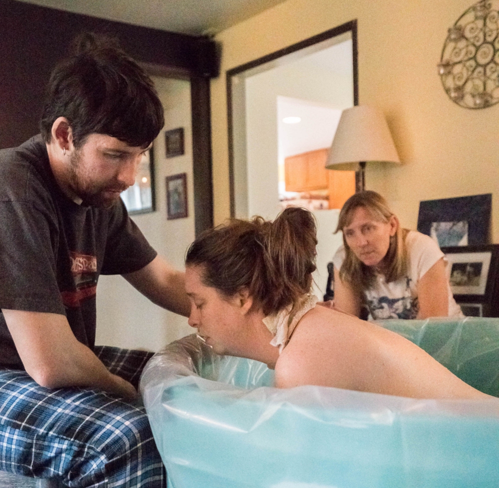 Even a relatively quick labor is HARD work. What beautiful support this momma gets from her partner!