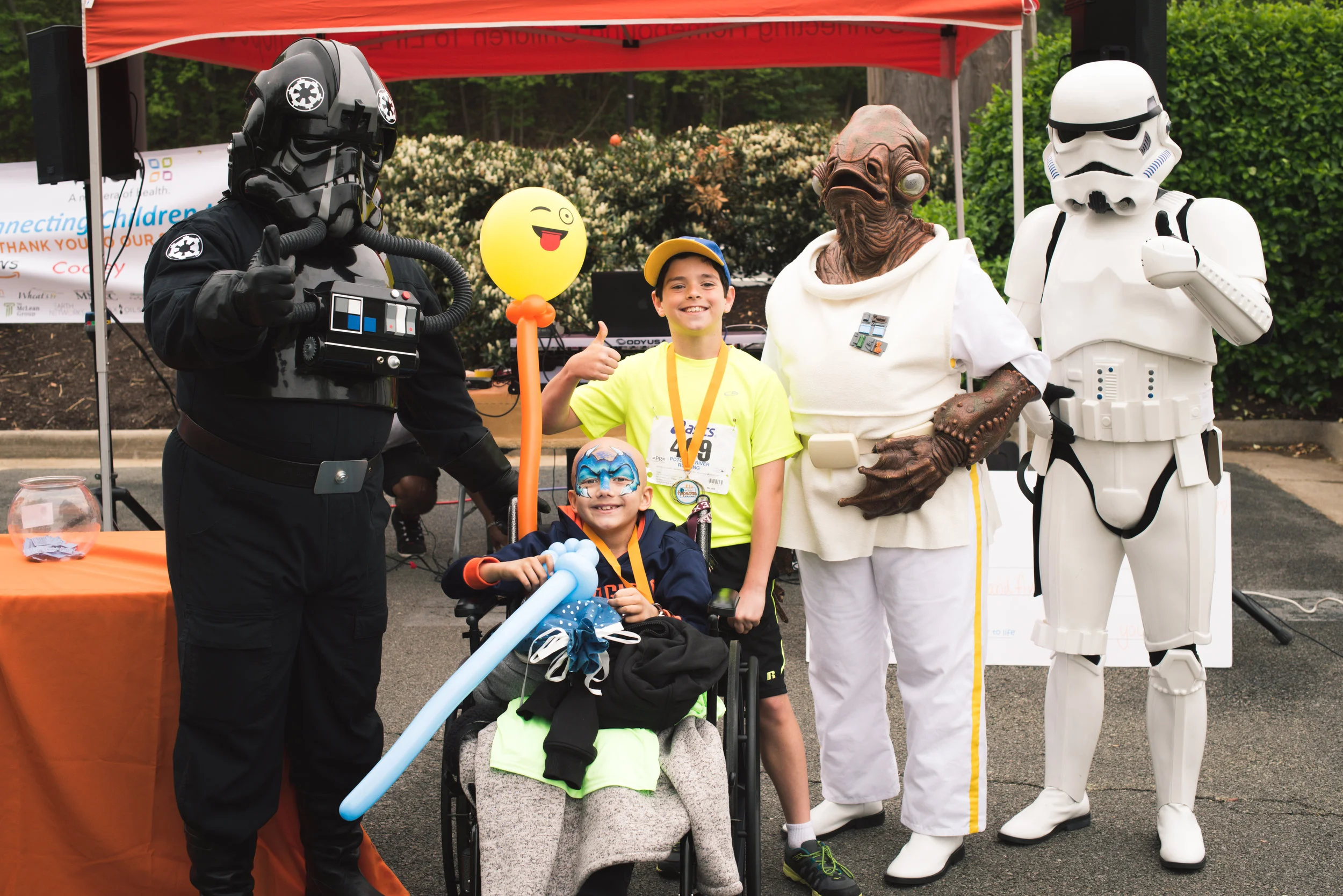 Members of the 501st Garrison Tyranus and our Honored Hopecam child Fletcher with our first place winner in the childrens division.