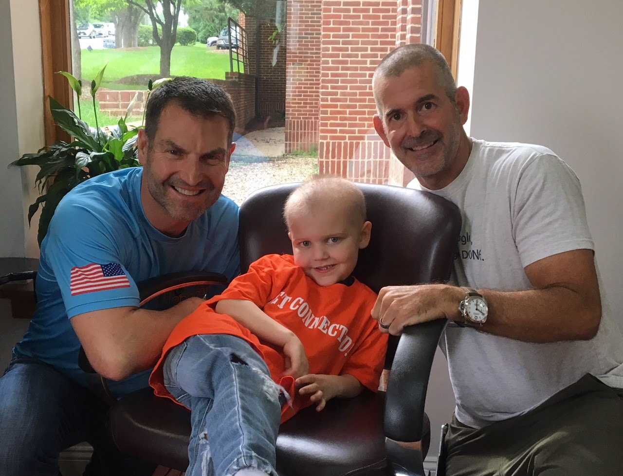 From Left: Hopecam Founder and 2X RAAM Competitor Len Forkas, 5 year old Hopecam kid Drew and Frank Fumich.
