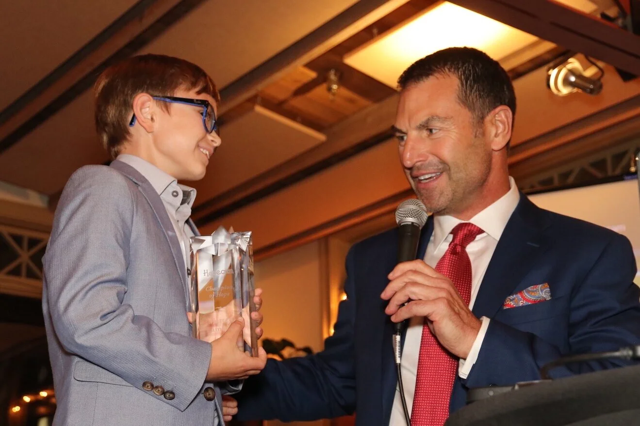 Matteo receiving his special award from Len Forkas