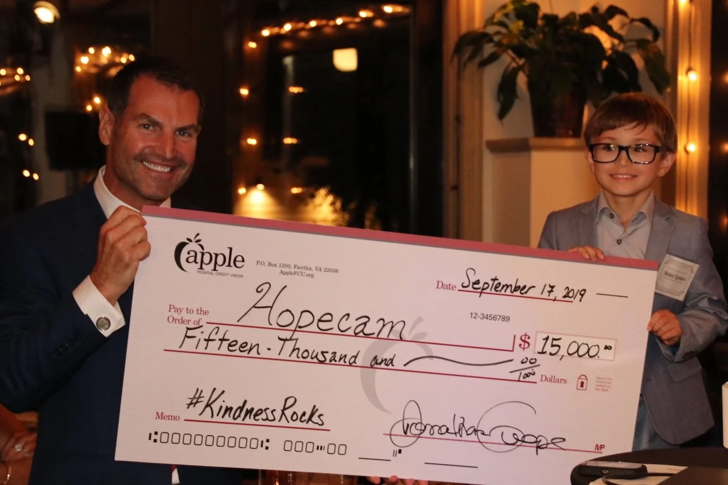 Len Forkas with Matteo and the $15,000 check to Hopecam from Apple Federal Credit Union