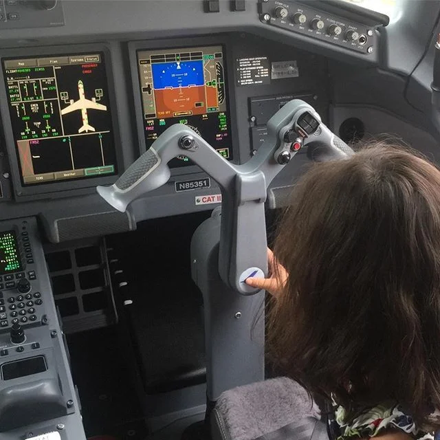 It's a yoke!  Skye was getting a tour of the flight deck on our way home and she informed the pilot it's called a yoke.  I wish this flight was to New Zealand.  Our last sale was to Auckland. #internationalsales #airplanes #yoke #globilization