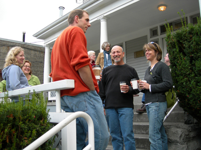 Trainees taking a caffeine break on the porch at MRC/WCC