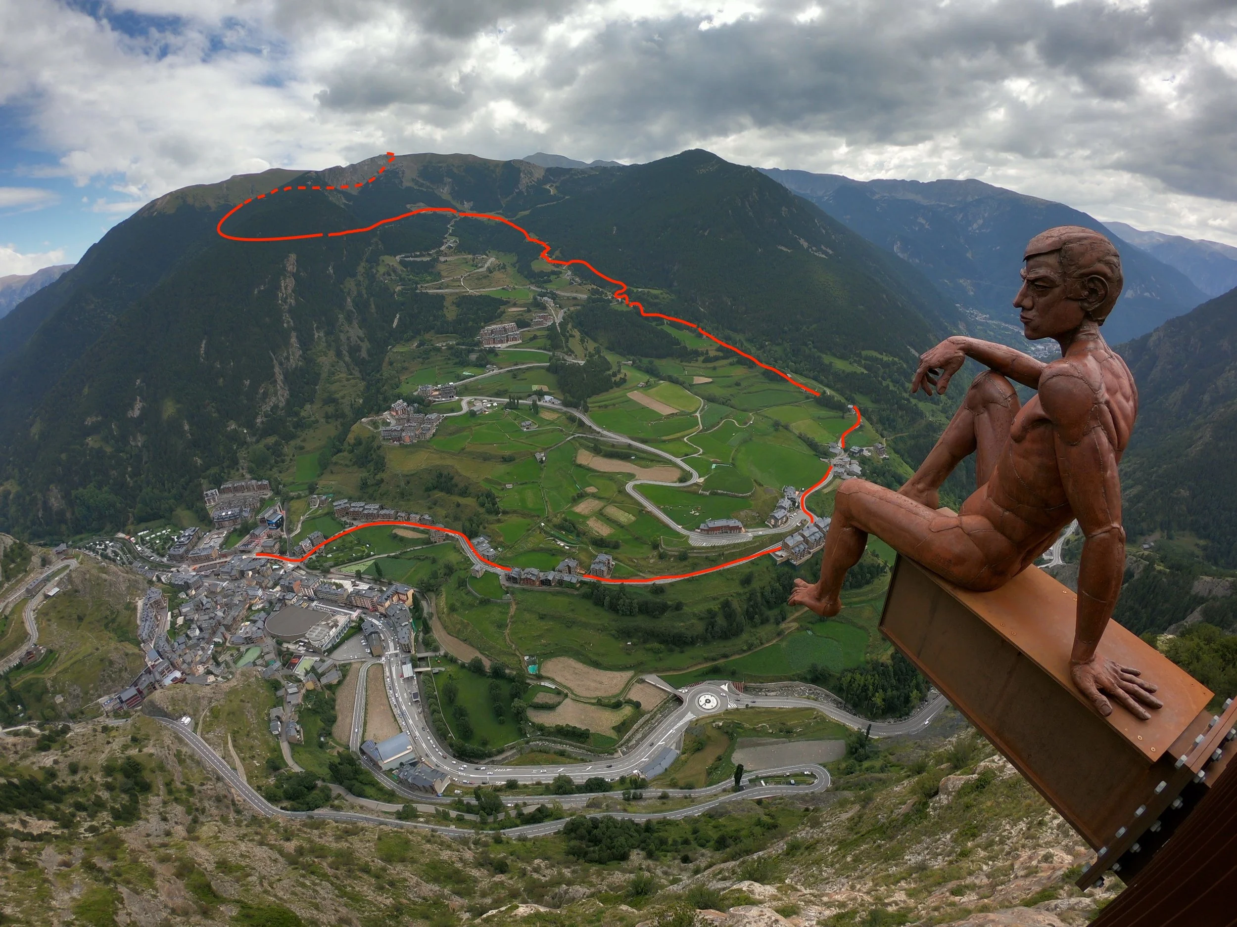 The red line represents the approximate race course. I took this photo from Mirador Roc Del Quer looking SE. I drew the red line myself and it is not perfect but does represent the approximate route.