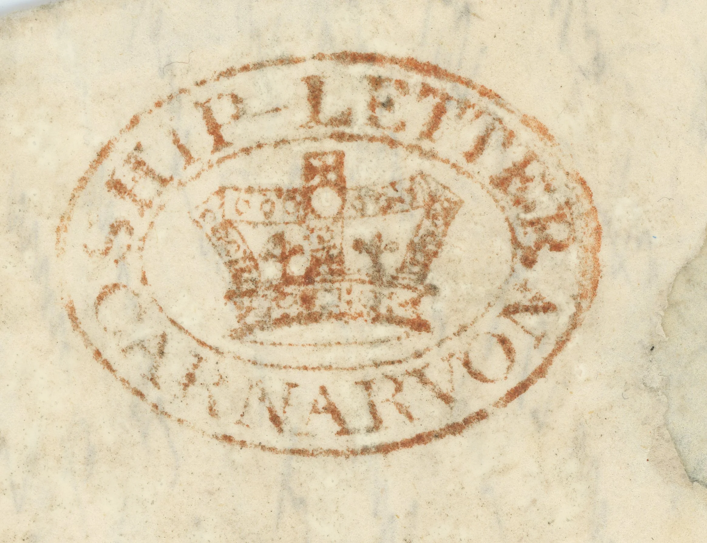Carnarvon Ship-letter (crowned) - Robertson E.30/B S2. Only two examples have been recorded, from the same provenance - letters from St John, New Brunswick- by private ship to Pwllheli. The 1823 letter to London recorded by Robertson carries a very indistinct mark in which only the . . . ON of CARNARVON can be distinguished. The 1824 letter to Edinburgh which bears the above mark, also carries a PULHELY straight-line stamp.