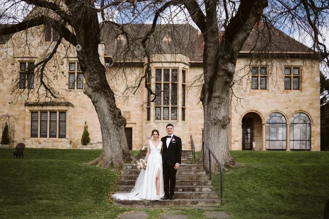 Carrick Hill Wedding with bride and groom in front of the beautiful house with Penelope Carrick as the Adelaide Marriage Celebrant