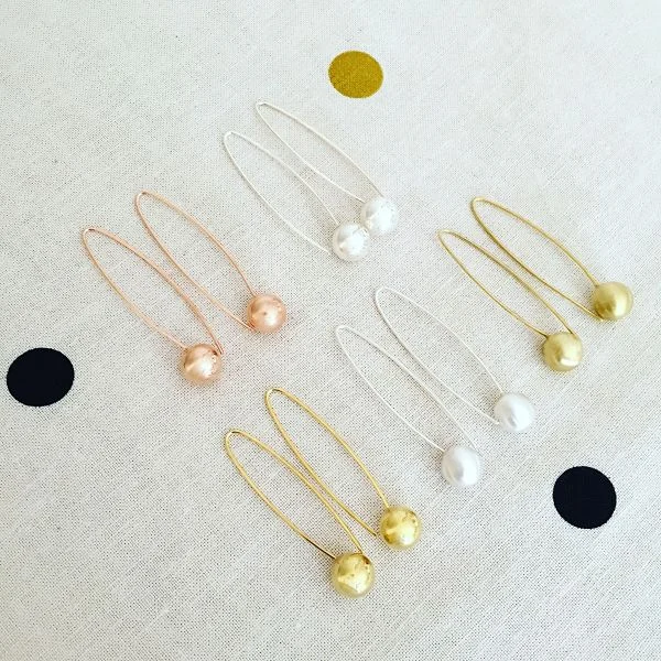 Handcrafted Long ball earrings in Sterling Silver, Rose Gold and Yellow Gold. Sterling Silver $90. Gold $99 each.