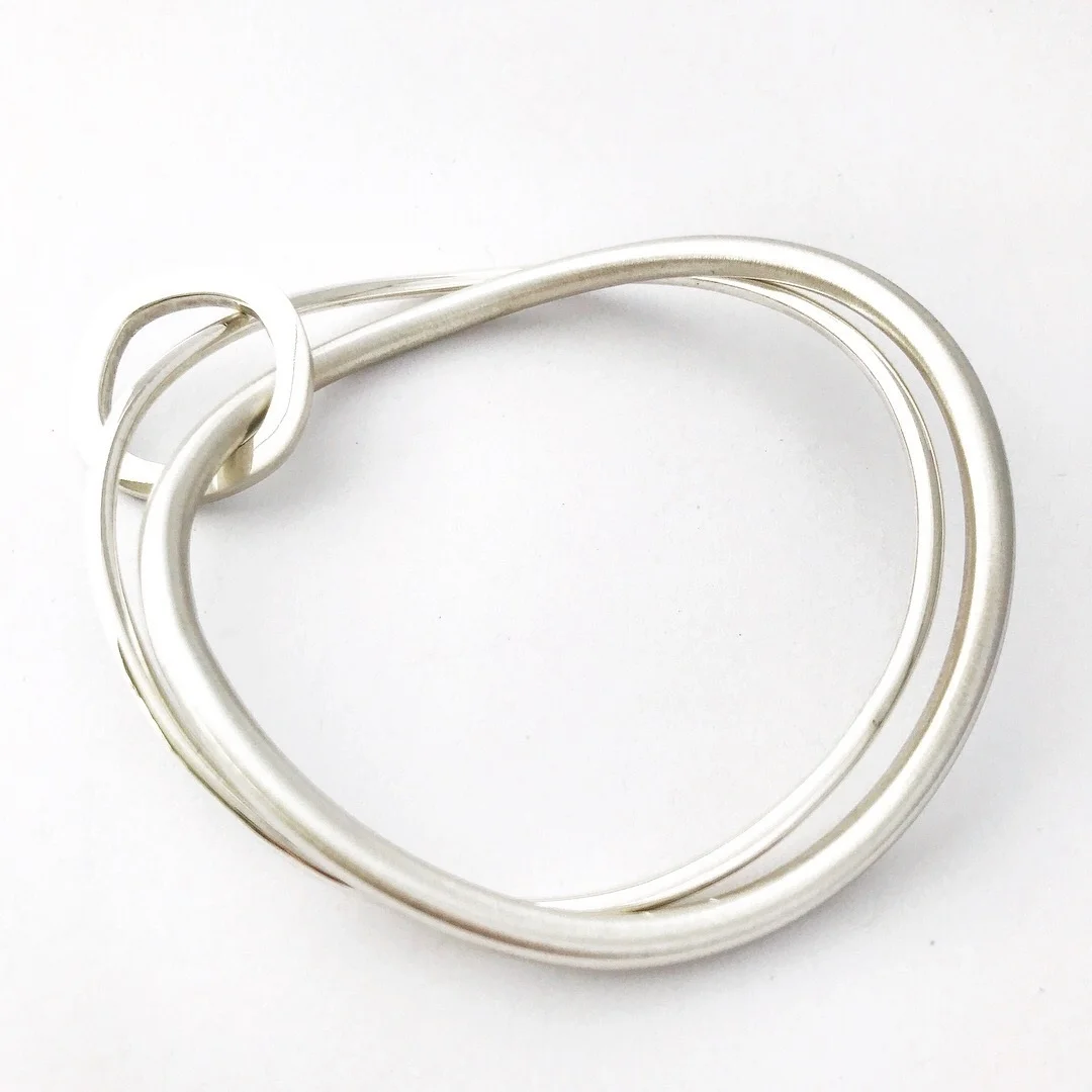 Sterling Silver Double Round Bangle with Square Reversible Ring. $260