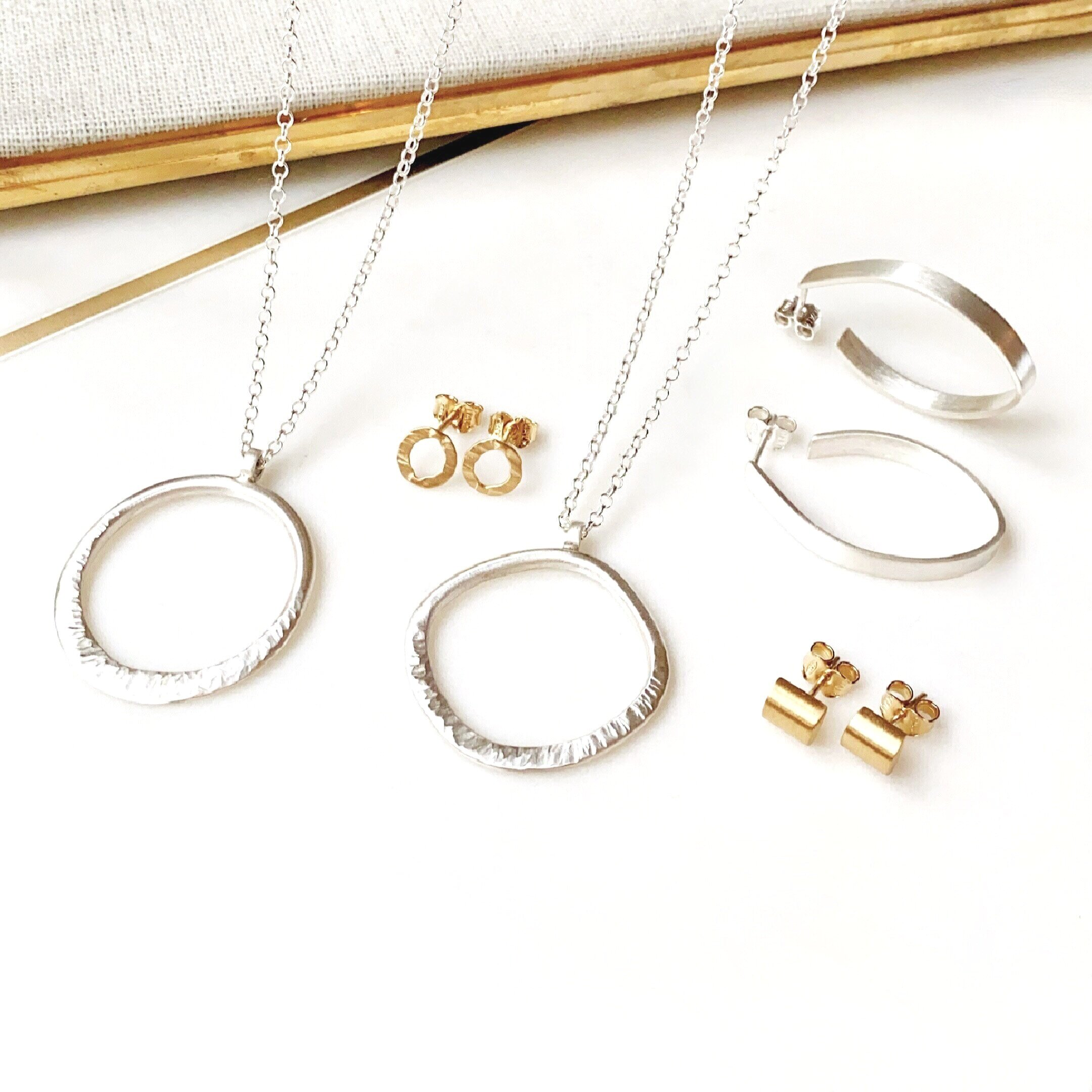 Beautiful brushed Sterling Silver and yellow gold handcrafted jewellery