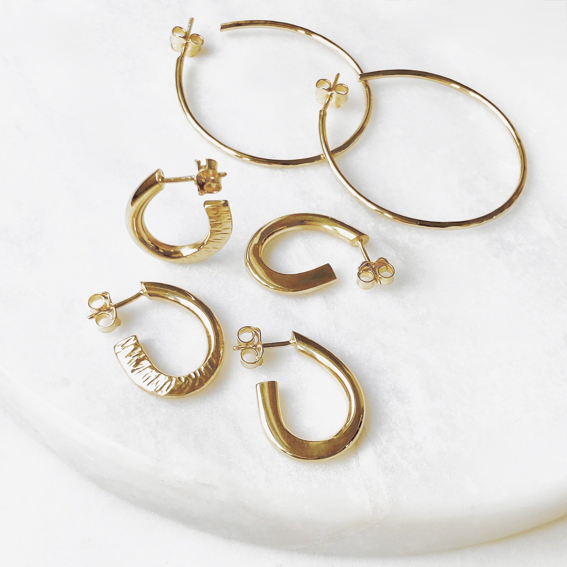 Handcrafted gold hoops