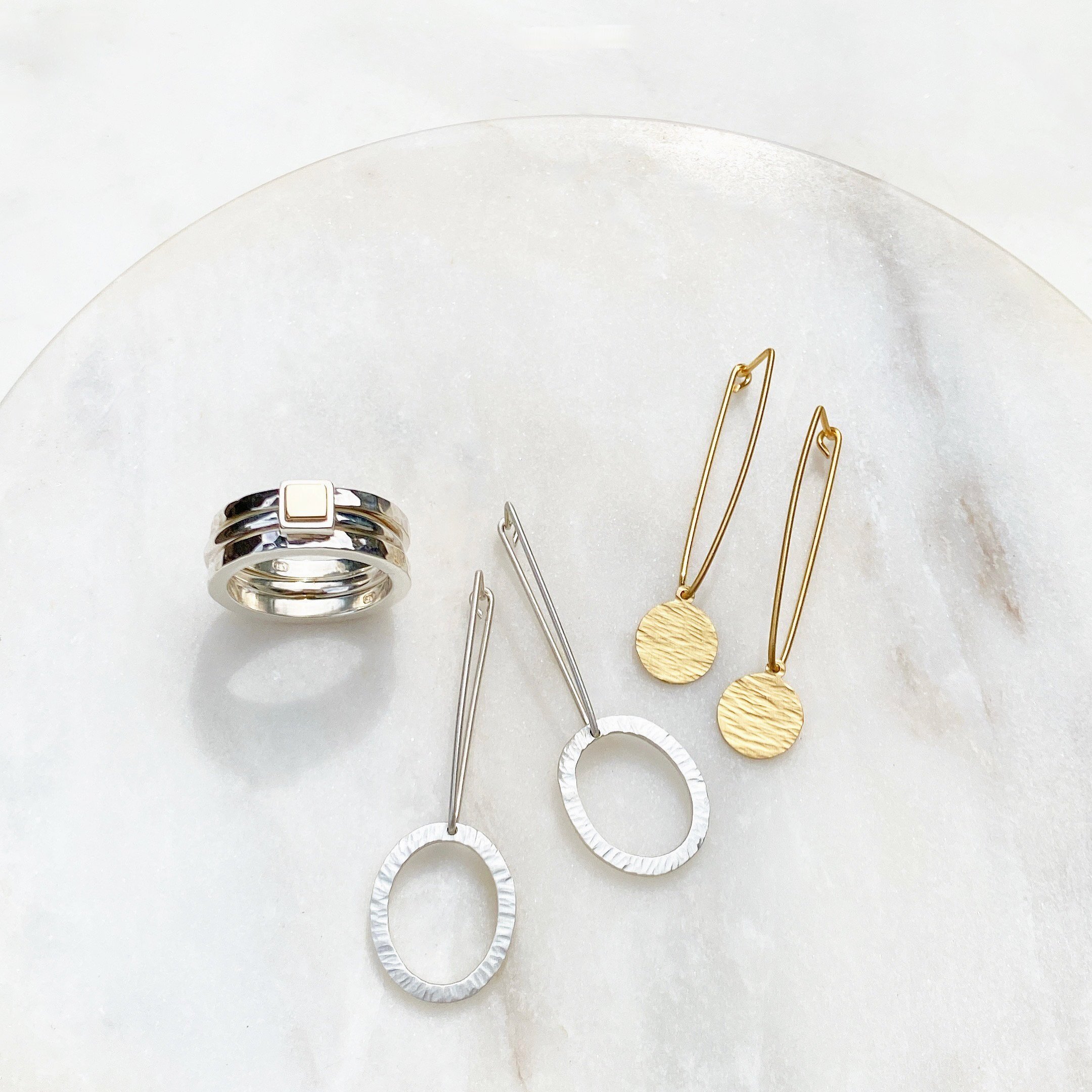 Ant Haus Designs handcrafted earrings and rings in Gold and Sterling Silver