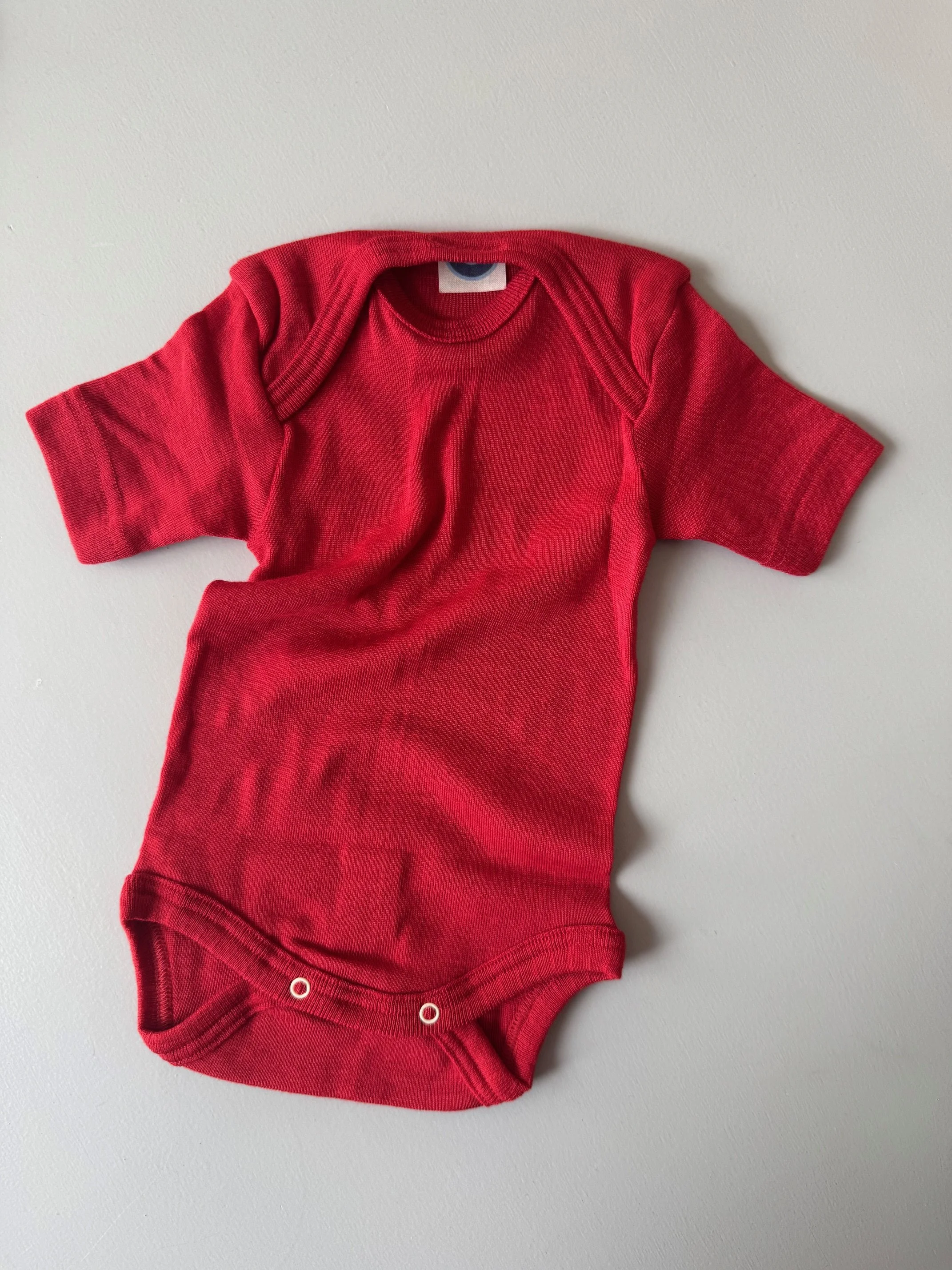 cosilana, short sleeved wool and silk baby body, red