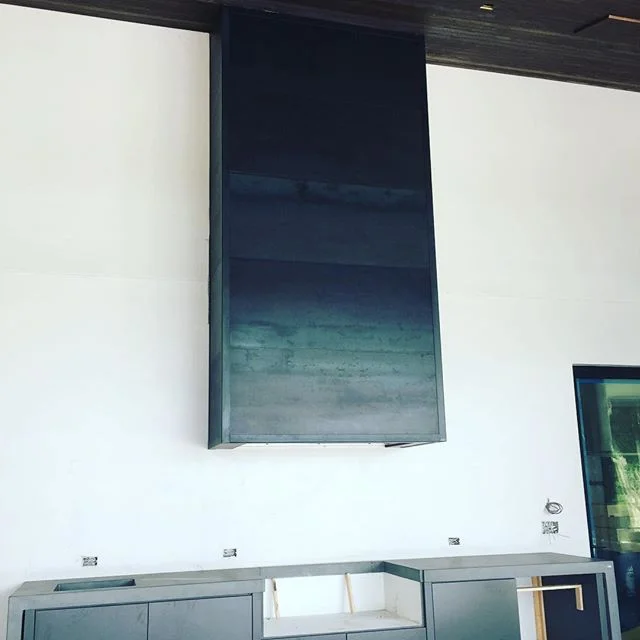 ¡ Project Wrap Up ! - This summer kitchen vent hood is cladded with hot rolled steel in a Matte Finish🔥The natural heat signatures were left in the steel to show a gradient color variation from light-ish gray to dark steel gray. It really toughened up the aesthetic of this kitchen 💪🏼More pics to come once the grill and fixtures are installed. #claditup