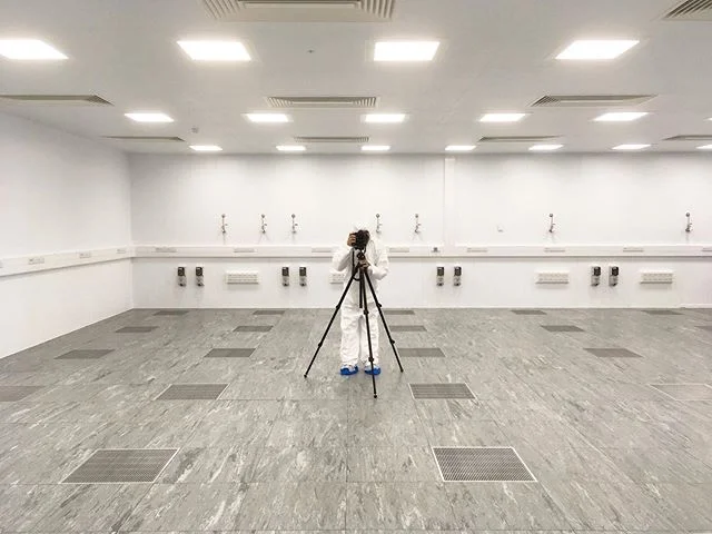 Bts, me in a body suit, in a clean room, shooting hdr images with an old tripod. One of the stranger locations i&rsquo;ve shot recently, very white and very light on sensations.  #photographer #lab #cleanroom #locationphotography #bts #longexposure #