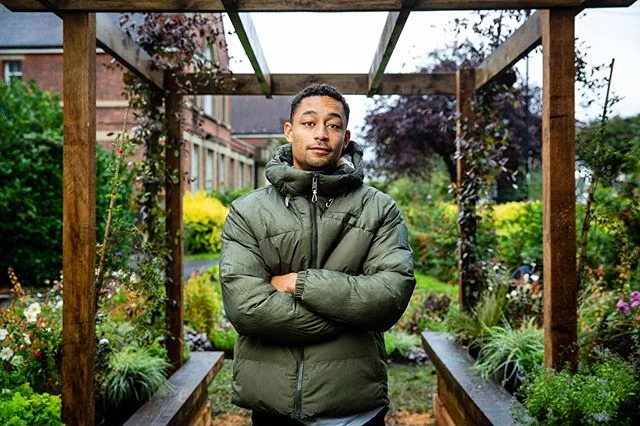 The amazing @loylecarner keeping his sense of humour whilst being shot in a rain storm for @timberland @mtv and @drum_agency during a break in the filming of the #concretegreen documentary. Off camera @rebeccagrayphoto is standing under a golf umbrel