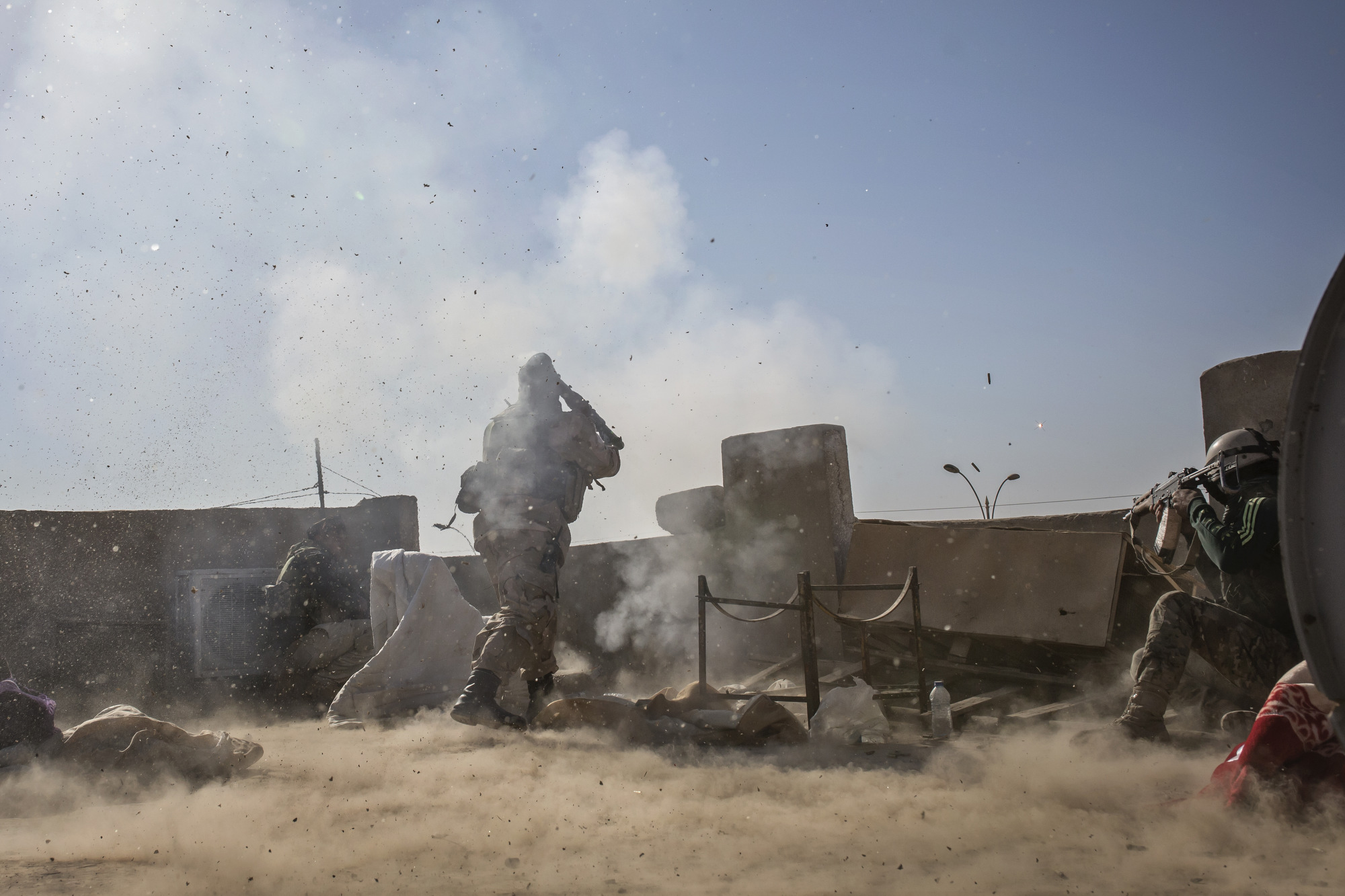  An Iraqi soldier fires an RPG at Islamic State positions in Mosul. 