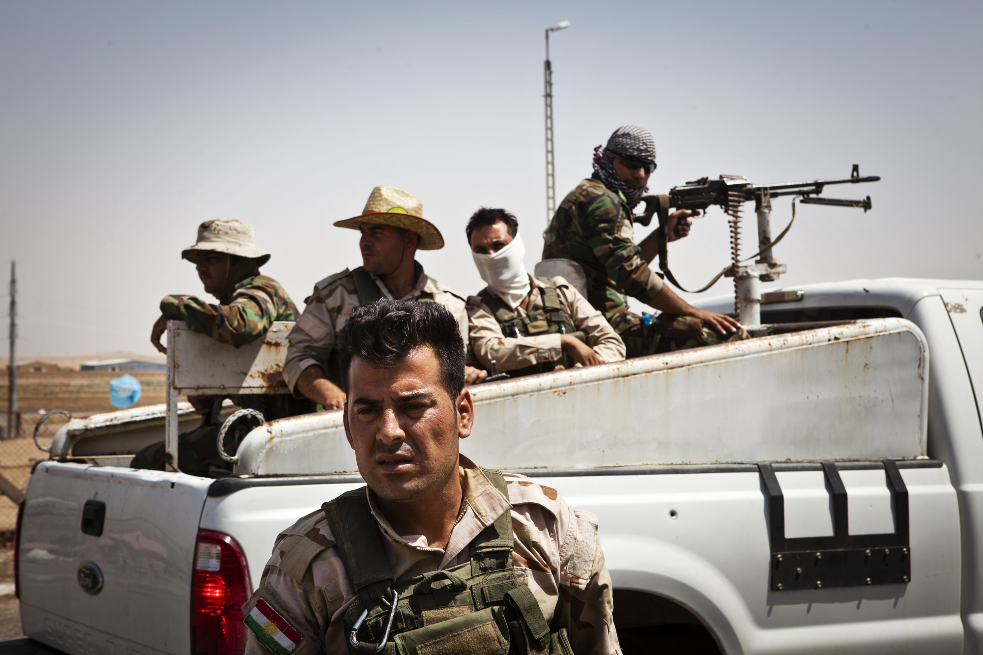  Peshmerga prepare to go on patrol. 