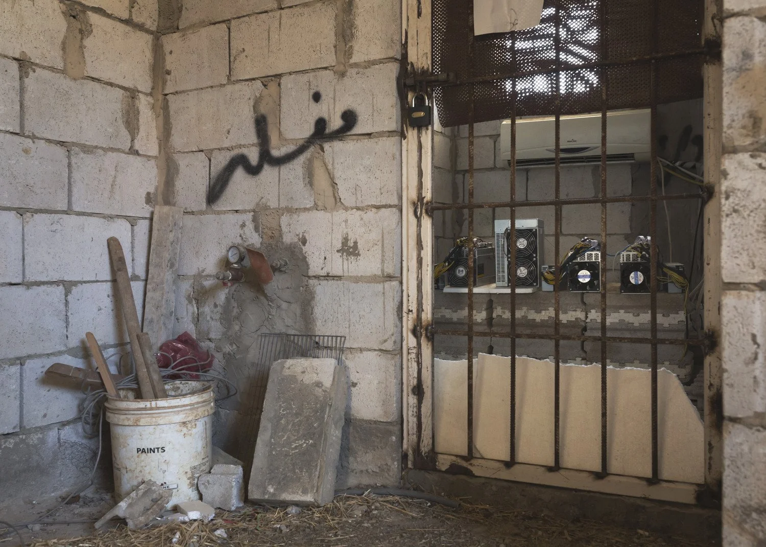  Mining machines in an unfinished house. 