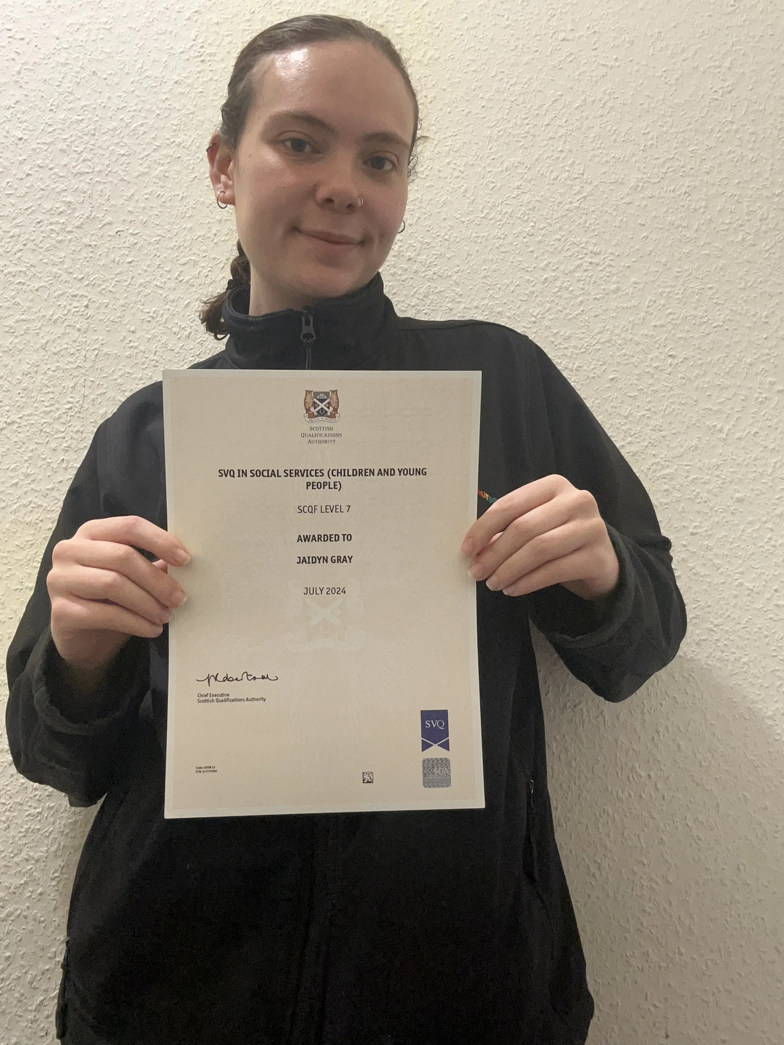 Jaidyn shows off her SQA certificate