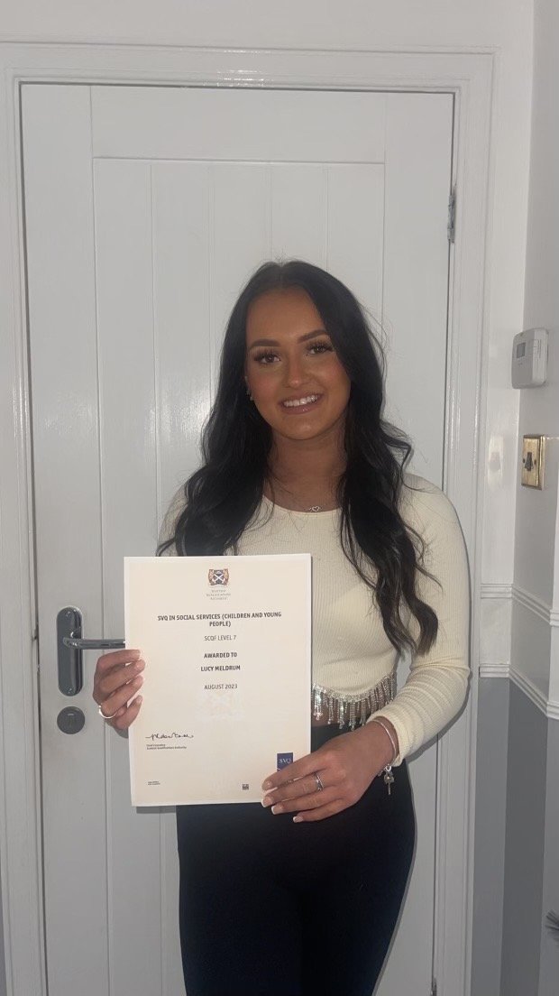 Lucy Meldrum who recently passed the Childcare Modern Apprenticeship holding her certificate