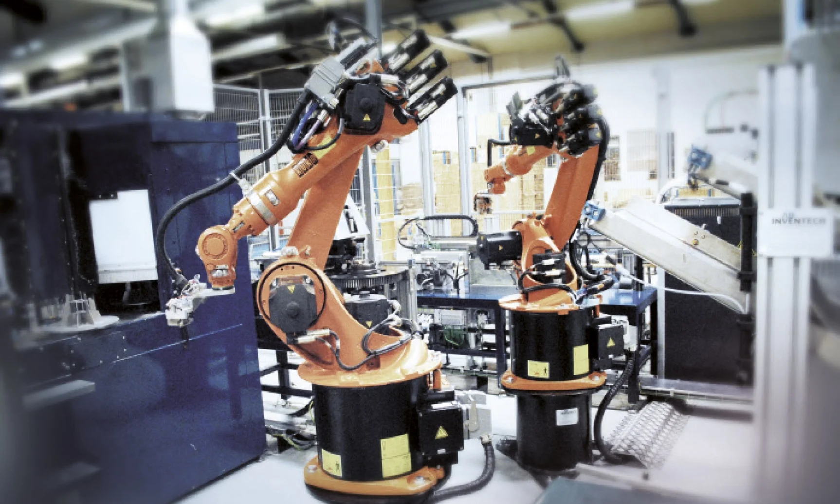 ROBOT SYSTEM A fully-automated robot system for the line production of steel clamp rings.