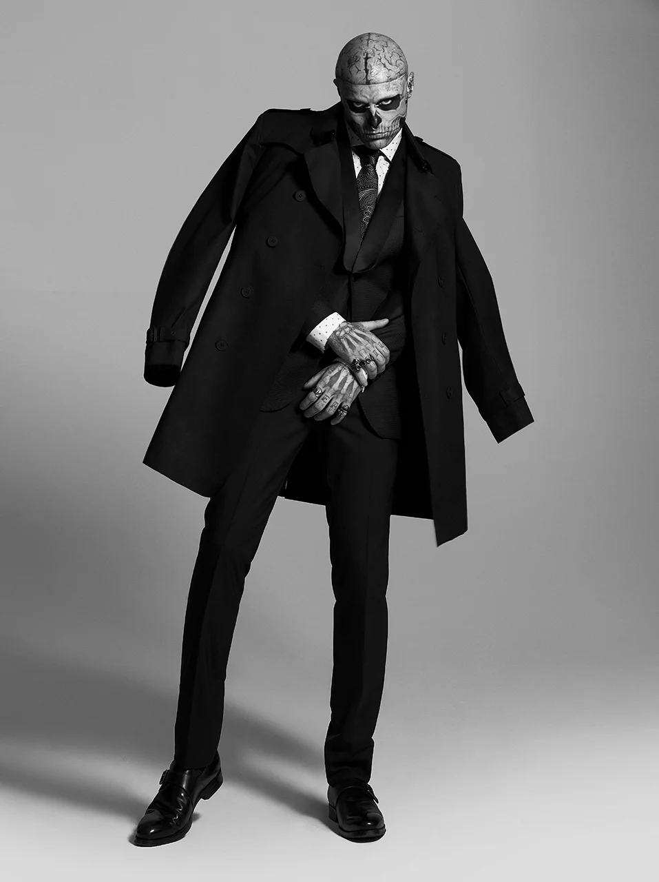 Trench coat HUGO BOSS $1,095. Blazer J.LINDEBERG at HUDON'S BAY $795. Shirt TED BAKER at HUDSON'S BAY $135. Tie TONELLO at MICHEL BRISSON $165. Pants HUGO BOSS $195. Shoes ALDO $130. Rings GUCCI $250-$365.