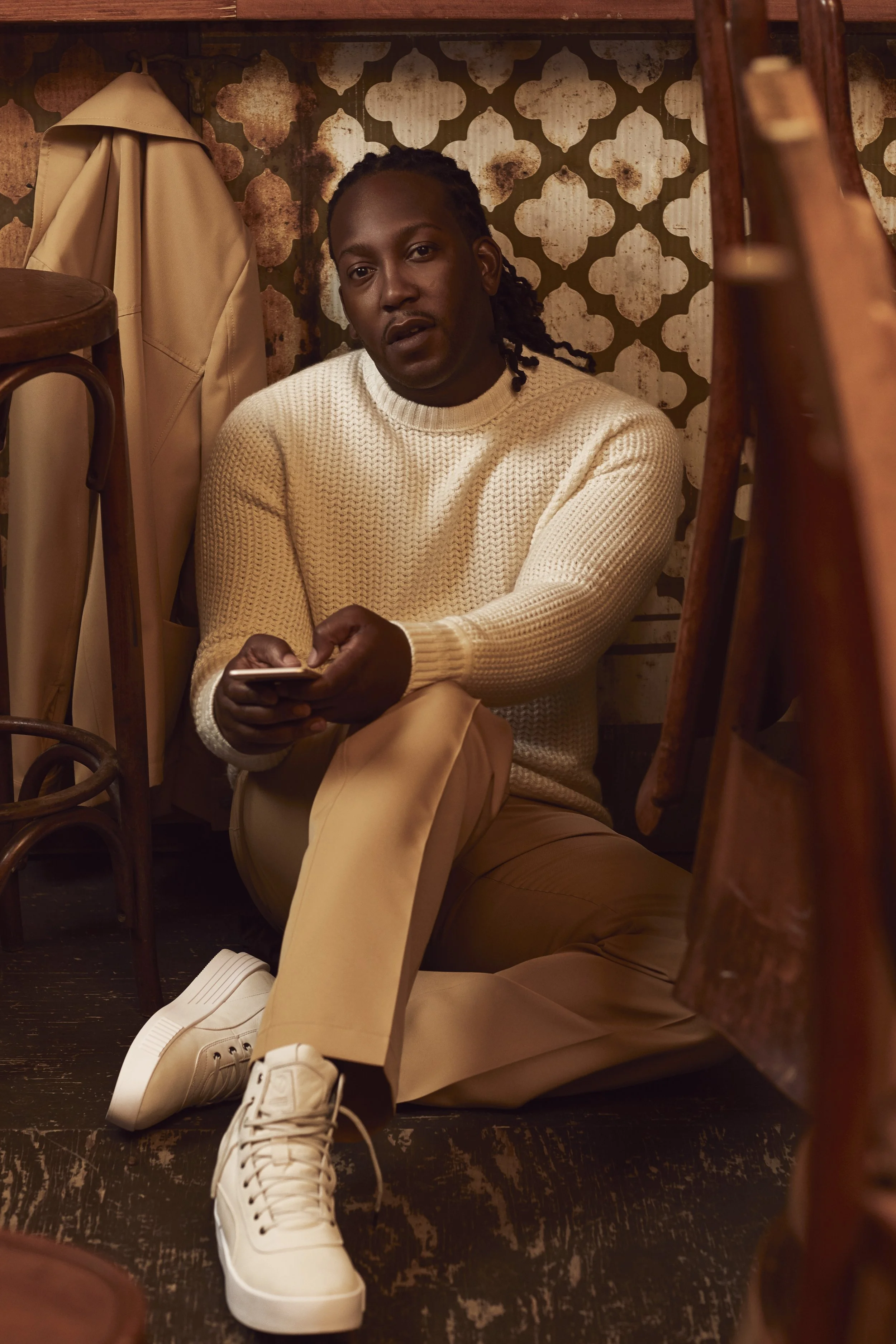 Pants and jacket MARNI at HOLT RENFREW. Sweater BERLUTI at HOLT RENFREW. Shoes THE WEEKEND X PUMA XO COLLECTION.