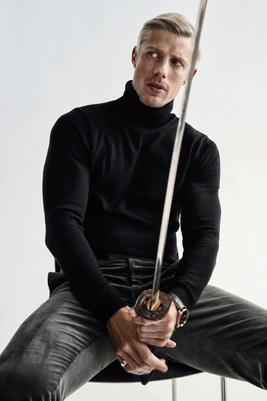 Jacket ($619) and pants ($299) TIGER OF SWEDEN. Turtleneck TOM FORD ($1,285 USD). Pocket square ETON ($80). Watch RADO ($1,950).