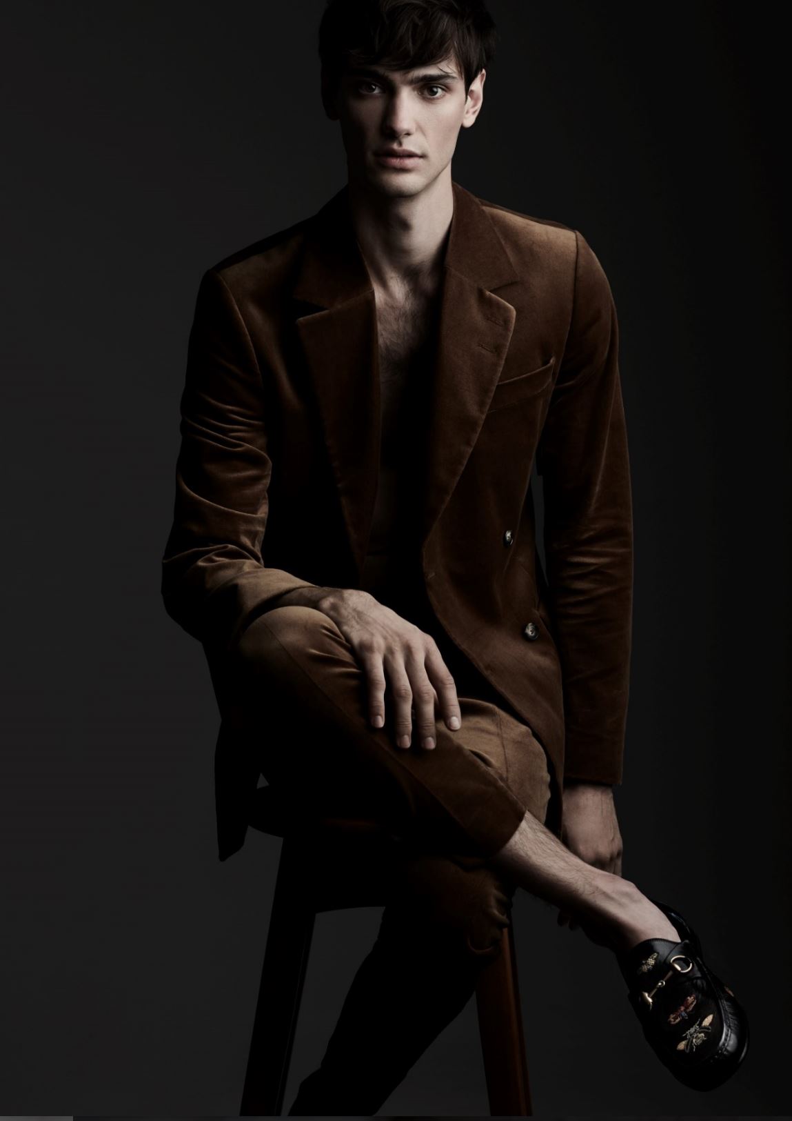 Suit blazer ($749) and pants ($349) TIGER OF SWEDEN at SIMONS. Shoes ($975) GUCCI at HOLT RENFREW.