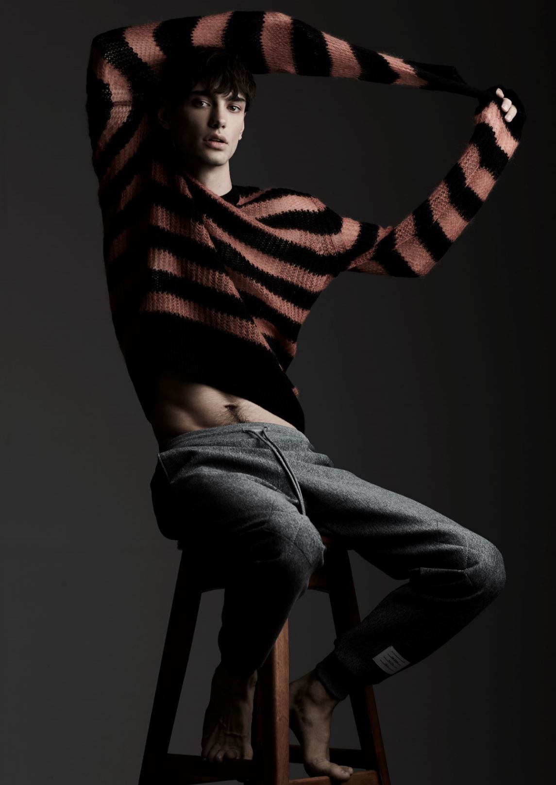 Sweater ($840) MCQ at SIMONS. Pants ($1,280) THOM BROWNE at HOLT RENFREW.