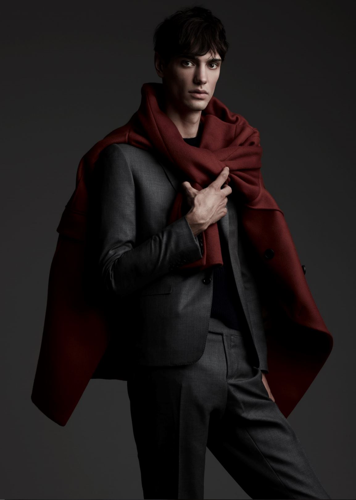 Suit ($3,495) THOM BROWNE at HOLT RENFREW. Coat ($1,400) WOOYOUNGMI at SIMONS.