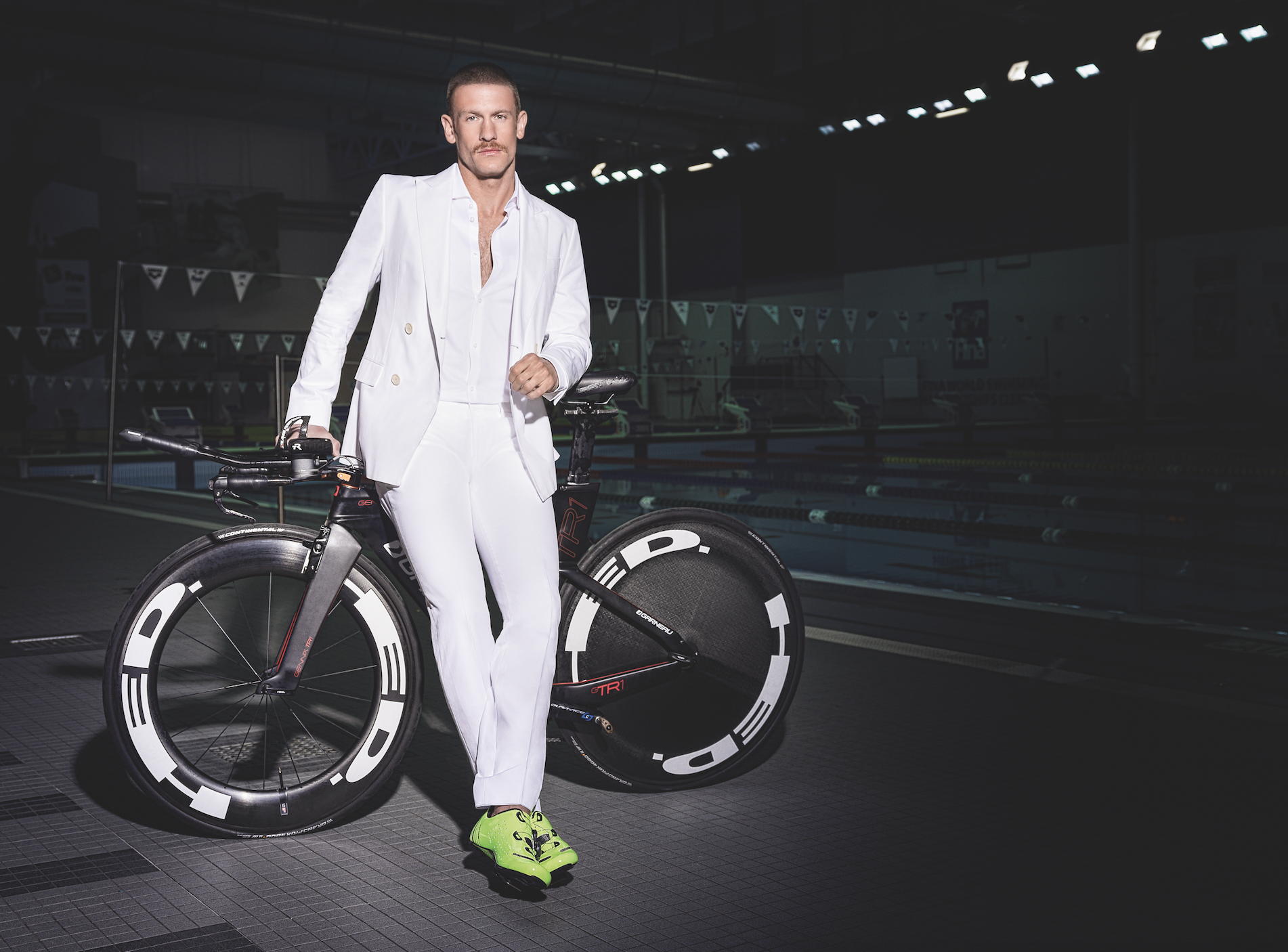 Suit ($1,195) and Shirt ($225) BOSS. Eyewear ($550) ROBERT MARC at JOSEPHSON OPTICIANS. Bike & Shoes LIONEL'S OWN.