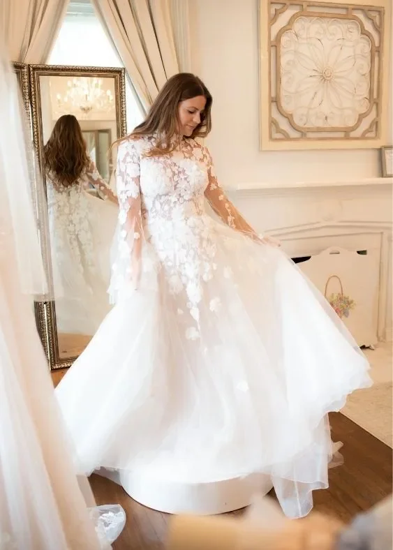Modest wedding dress with long lace sleeves