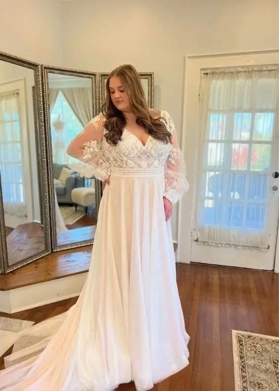 Long sleeve lace wedding dress with tulle skirt