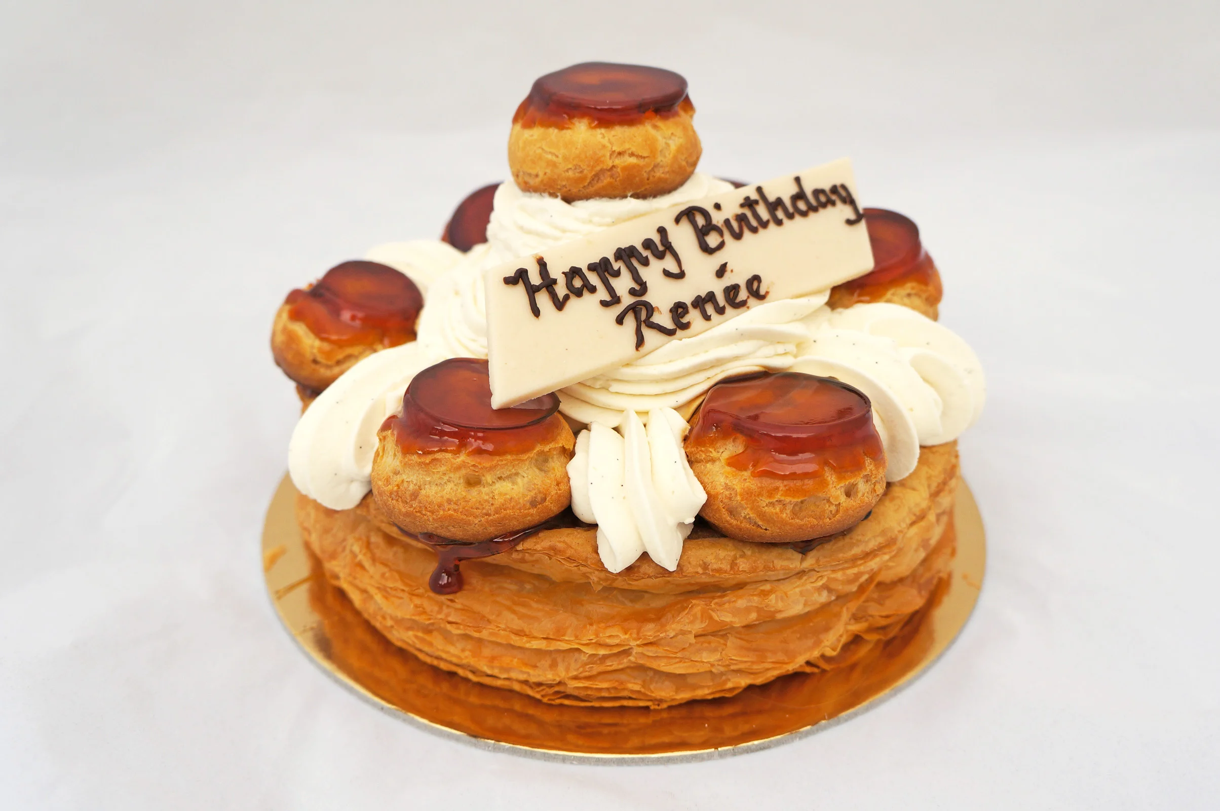 St. Honore Puff pastry, vanilla bean Chantilly cream, vanilla pastry cream, and caramelized cream puffs (special order).