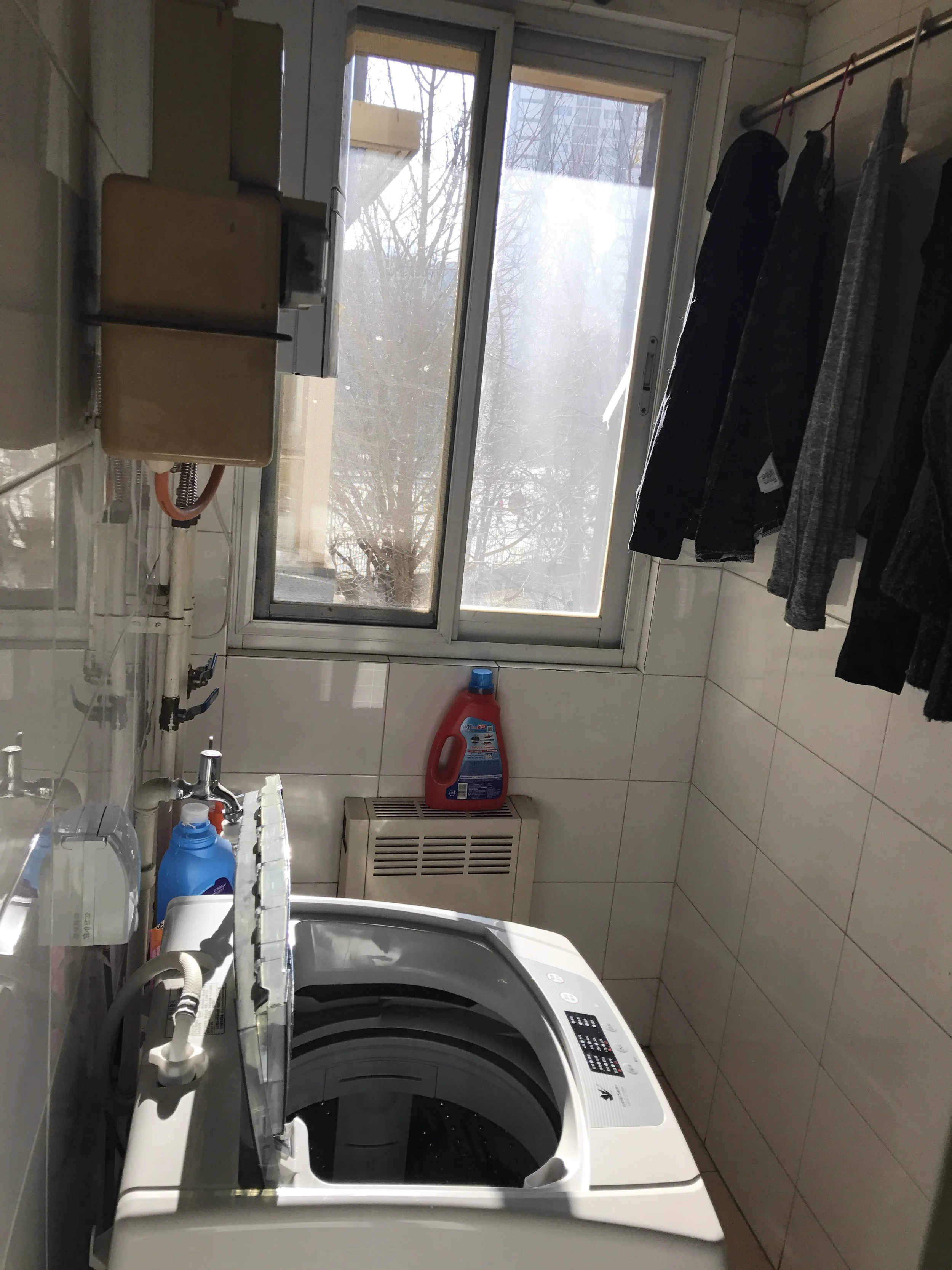 Very nice laundry room. There's also a drying rack that we all share. 