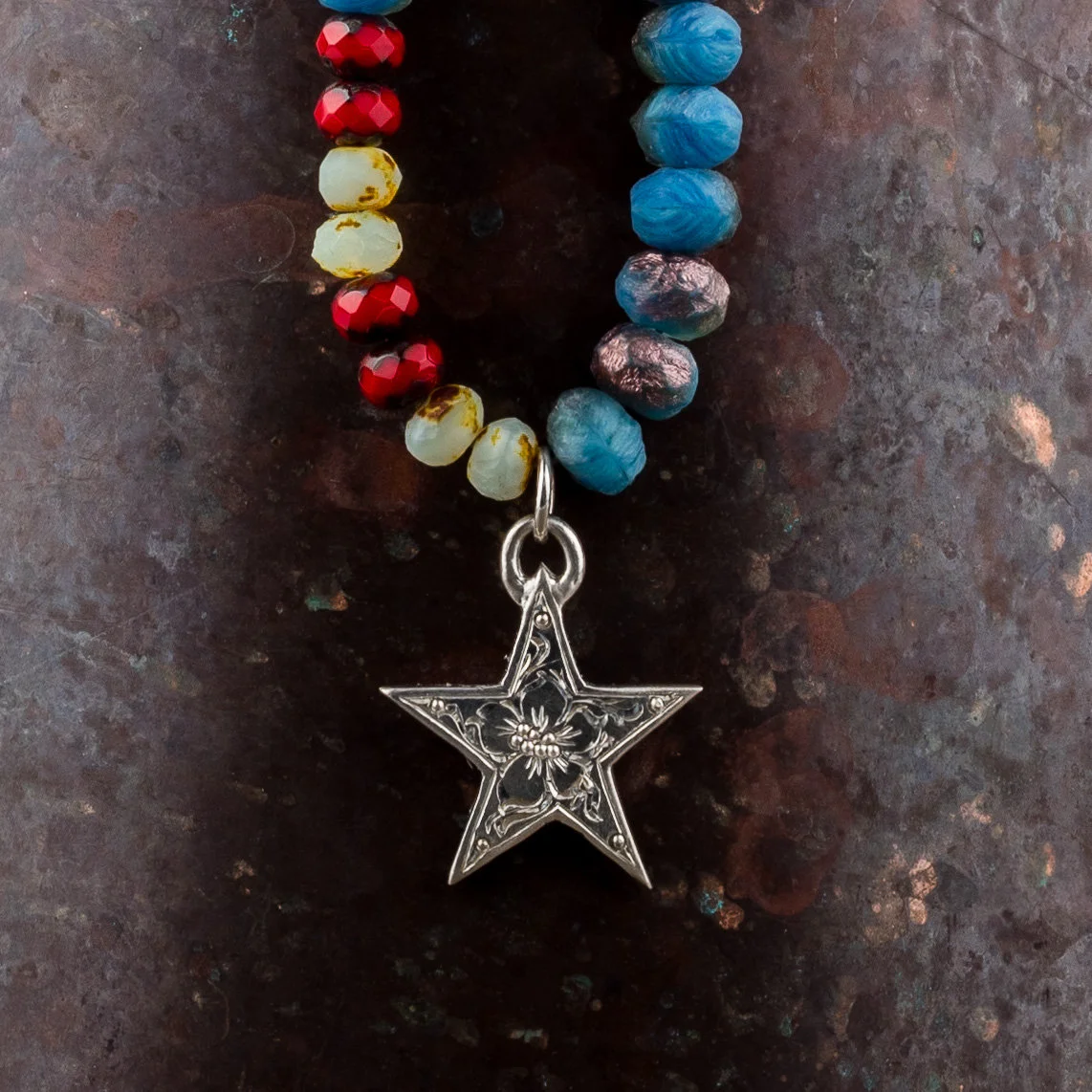 Engraved Star Charm on Czech bead bracelet