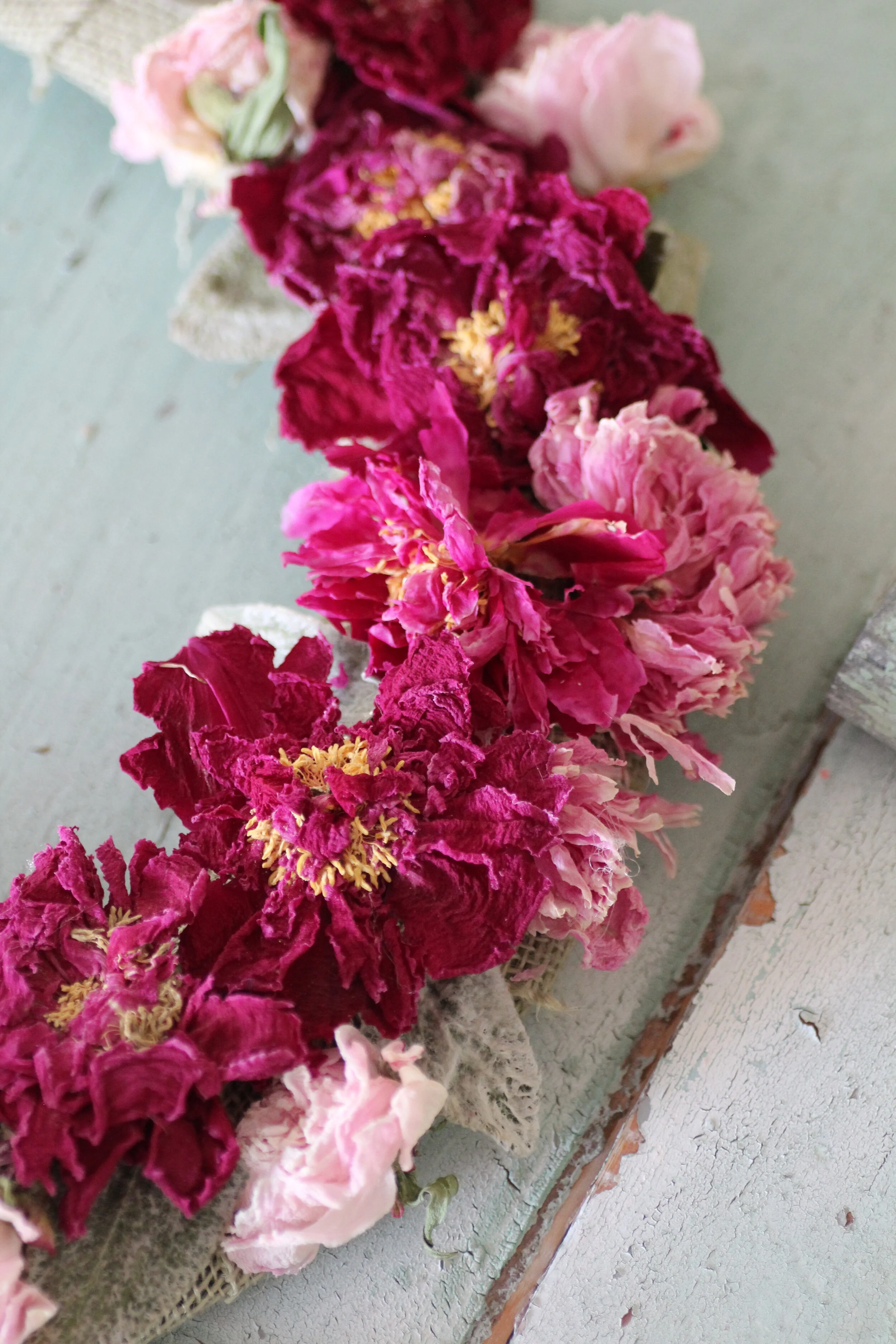 Burgundy red and pink dried peony wreath