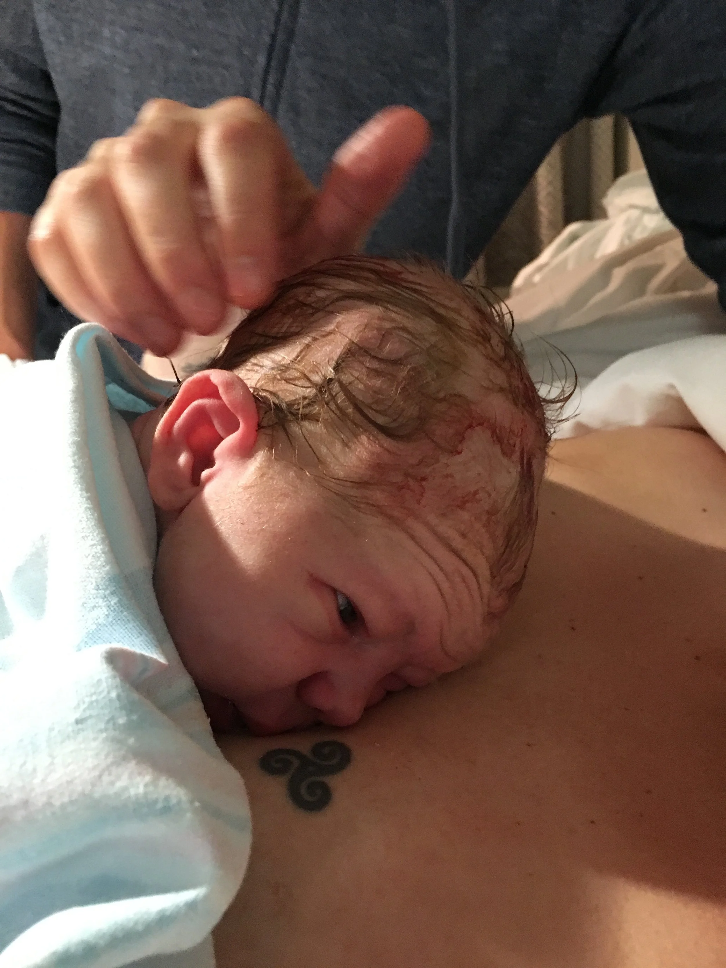 Just moments after meeting our son for the first time -- 7:29pm on January 2nd!
