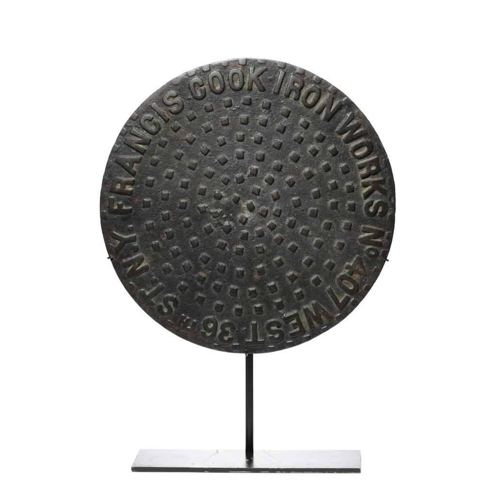 Antique cast iron manhole cover, circa 1890