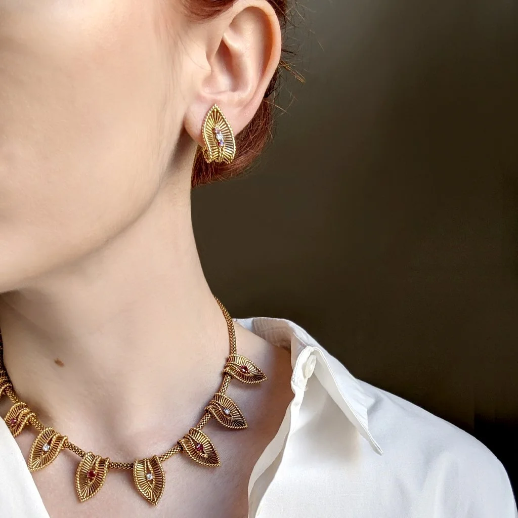 Gold, ruby and diamond necklace and 