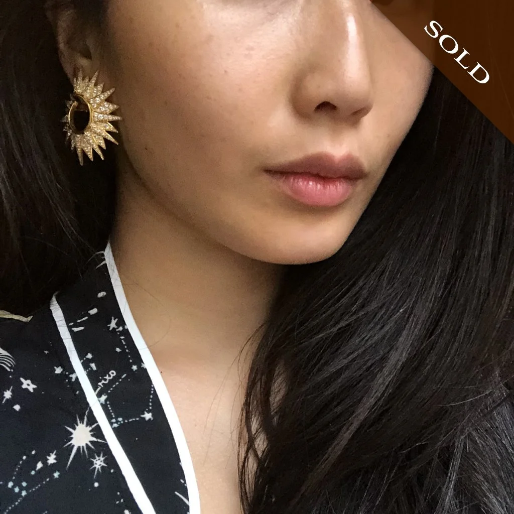 SOLD-Cartier-Starburst-Hoop-Earrings-Model.jpg