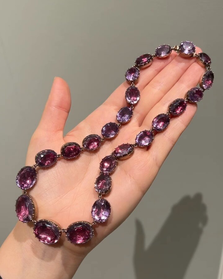 An antique amethyst rivi&egrave;re necklace, English, c. 1820, designed as a series of twenty four graduated oval cut foil backed amethyst mounted in gold. Available @simonteaklejewelry #georgianjewelry #georgianjewellery #georgianriviere #antiqueriv